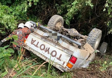 Woman killed, seven injured after four-wheel drive plunges into ravine in Keningau