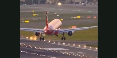 AirAsia pilot executes dramatic landing amid intense Taiwan crosswinds (video)