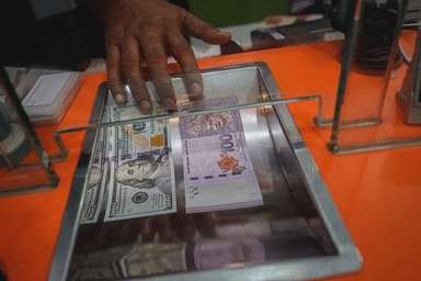 Ringgit opens lower against US dollar, rises v major notes