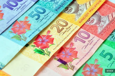 Ringgit opens higher versus greenback on upbeat GDP data