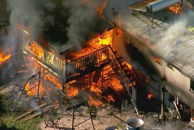 Murder victim's family lose home in alleged arson attack