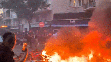 Hundreds arrested as shops and cars burned in wild football celebrations