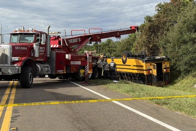 Two killed including student in 'horrific' Florida school bus rollover crash