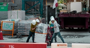 MOM to Move 230 Tuas Dorm Workers After Pay, Housing Issues