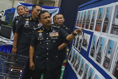 Police nab 58 in love scam bust targeting Singaporeans