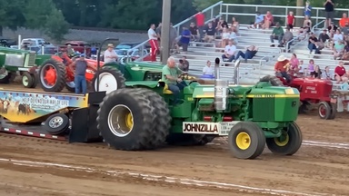 John Deere Tractor With V16 Detroit Diesel Tugboat Engine Is a Sled-Pulling Machine