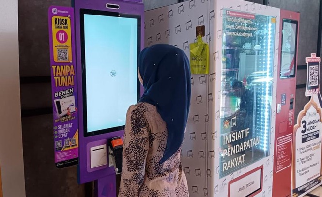 Image from: Kiosk TPay beroperasi 24 jam membolehkan orang ramai melakukan transaksi tanpa tunai di Terengganu