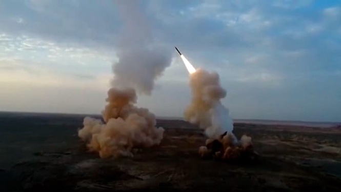 Iran launches strikes on neighbours as Trump threatens to hit power plants