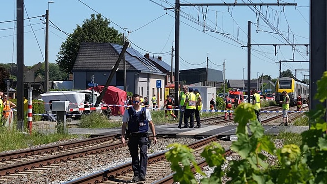 Four dead and two injured after train hits school bus in Belgium ...