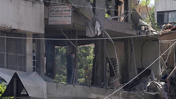 Iran warns of 'imminent' response as Israel strikes Beirut