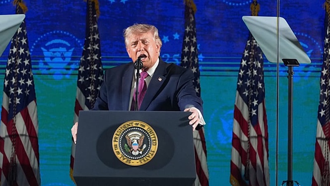 Trump warns of communist threat as Washington parade cancelled due to heatwave