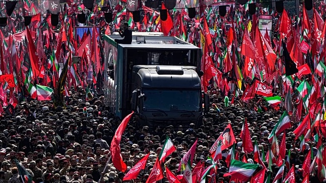 Ali Khamenei's coffin carried through the streets of Tehran