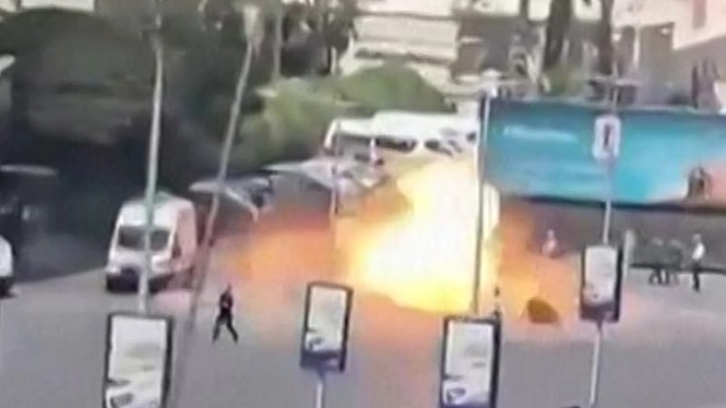 At least 18 wounded in Damascus blasts during Macron visit, Syrian officials say