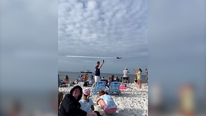 Watch: US Navy Blue Angels' low flyover leaves beachgoers stunned