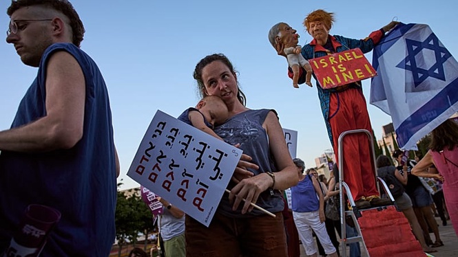 Israeli protesters march in Tel Aviv against West Bank settler violence