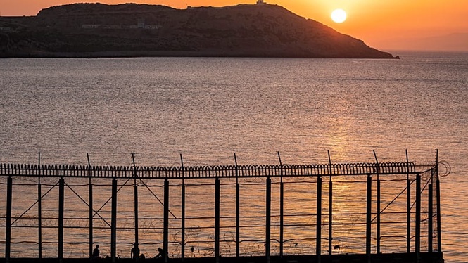 Hundreds of migrants swim from Morocco to the Spanish territory of Ceuta