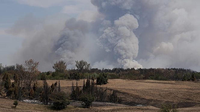 Emergency crews struggle to bring wildfire burning for weeks in Serbia under control