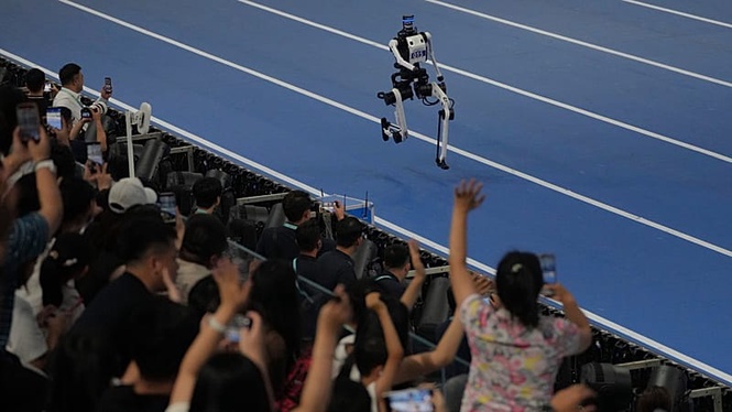 Beijing Robot Games: humanoids take on sprints, football and tai chi