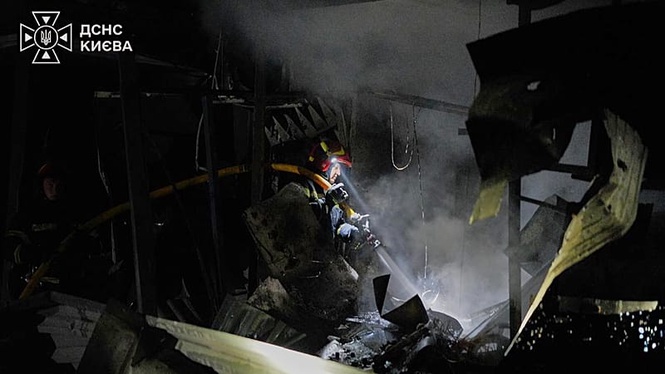 'Massive' Russian missile and drone attack on Ukraine's capital region kills at least 12, officials say