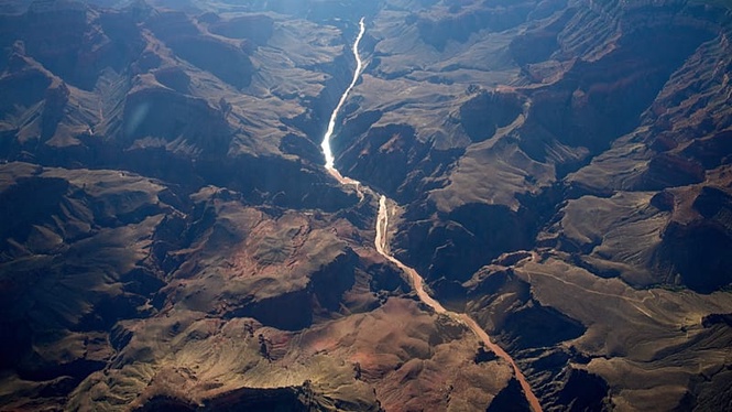 Two dead and one still unaccounted for in Grand Canyon flash floods, officials say