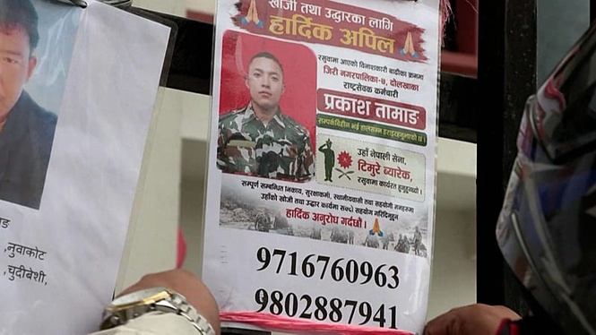 Nepal families post photos of missing relatives on Kathmandu hospital wall