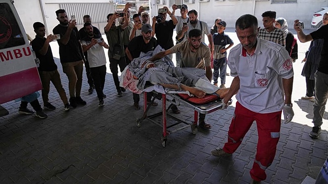 At least two killed and tents destroyed in Israeli strikes on Gaza camps