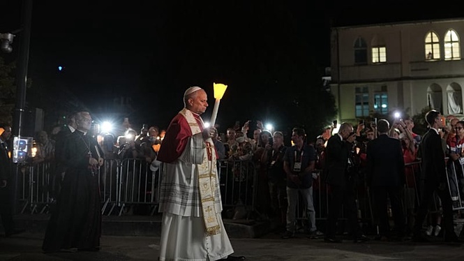 Pope joins pilgrims in Lourdes candlelit rosary as 150,000 attend mass