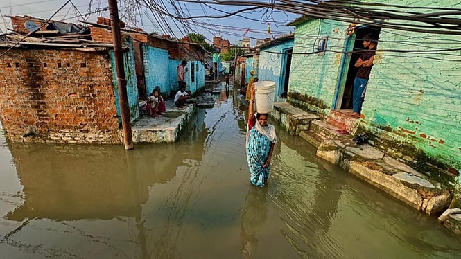 At least 81 killed after heavy rain and flooding in northern India, officials say