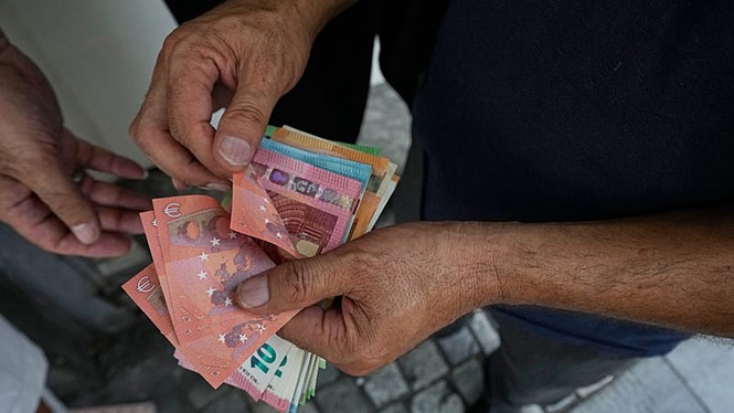 Euro slides to fresh lows against US dollar and British pound despite ECB rate hikes