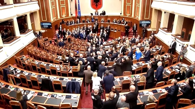 Scuffle breaks out in Albanian parliament as MPs clash over protests