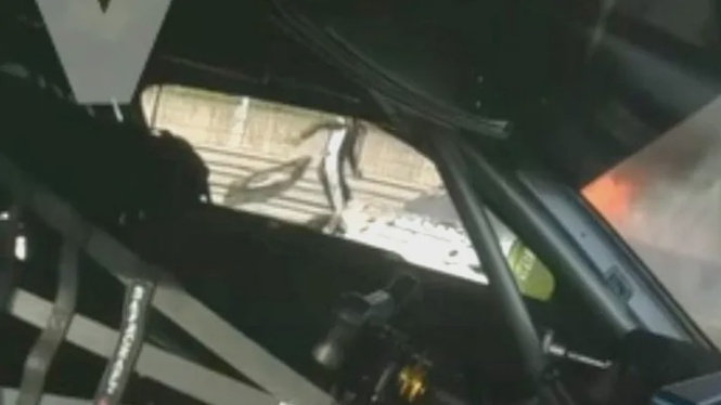 Image from: British Driver Ollie Millroy Says He Owes His Life To Rival Who Pulled Him From Burning Ferrari