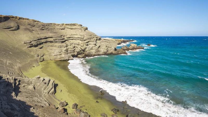 Image from: In the United States, this stunning beach is made of astonishing green sand (it’s one of the only ones in the world!)