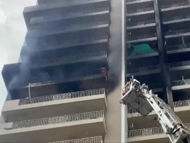 Image from: Fire breaks out in Noida's apartment, no casualties reported