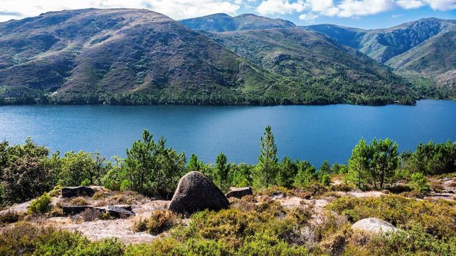 Image from: In Portugal, this lake conceals a surreal landscape in the heart of the mountains (an entire village lies beneath the waters!)