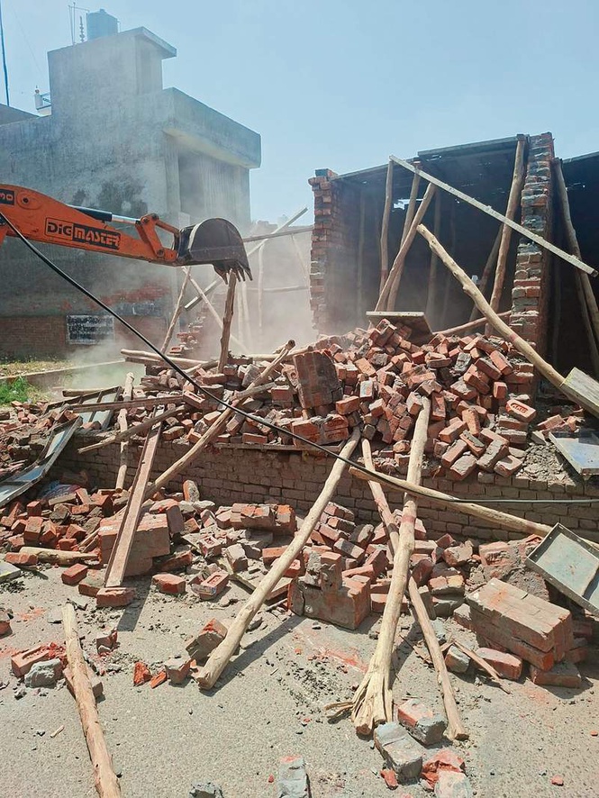 Image from: Ludhiana MC teams raze three illegal shops, construction under high-tension electricity line
