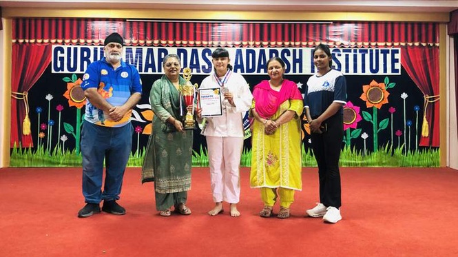 Image from: Young karateka Jasmin brings laurels to Goindwal Sahib school
