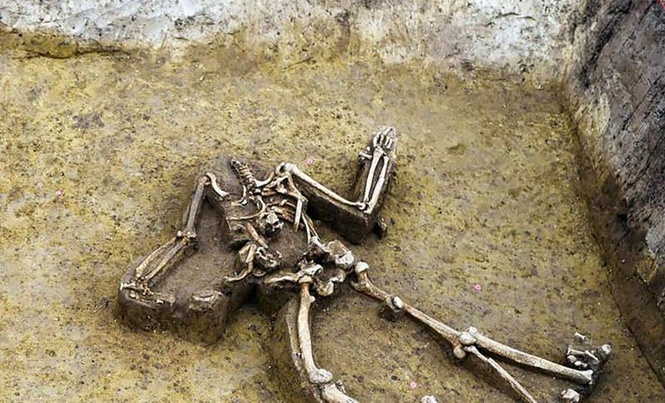 Image from: What Happened to Their Heads? Archaeologists Found 77 Headless Skeletons in a Pit at a 7,000-Year-Old Village