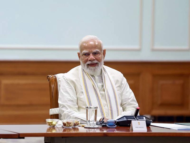 Image from: "Public service biggest test of good governance," says PM Modi as he completes 12 years in office