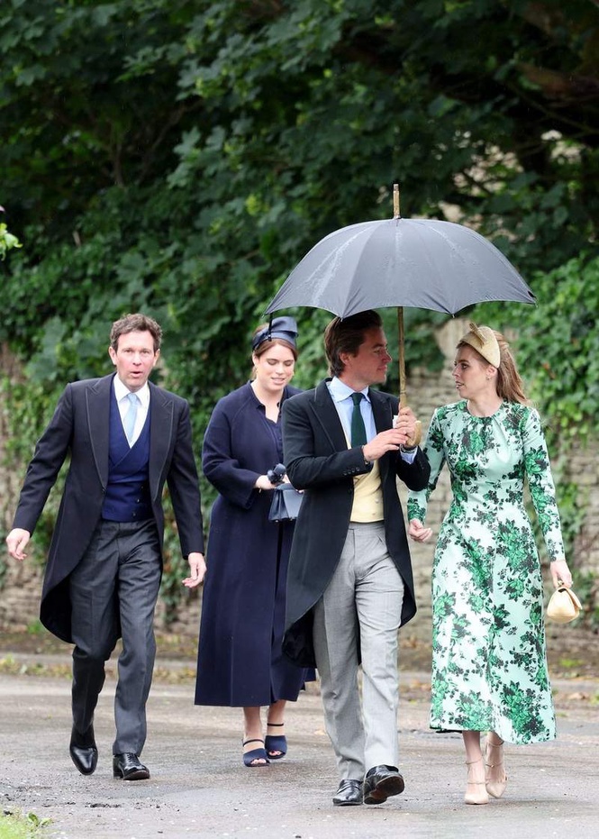 Image from: Beatrice and Eugenie's telling appearance at Peter Phillips's wedding despite storm surrounding them