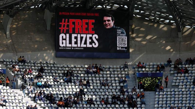 Image from: World Cup kicks off with empty seat for French journalist detained in Algeria