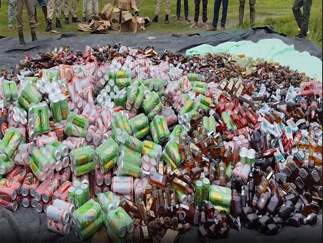 Image from: Illegal liquor worth Rs 15 lakh destroyed in Assam's Majuli; 1,475 litres crushed