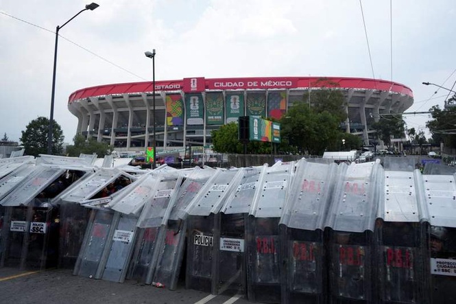 Image from: World Cup chaos as rampaging protesters fight police and man suffers heart attack outside stadium