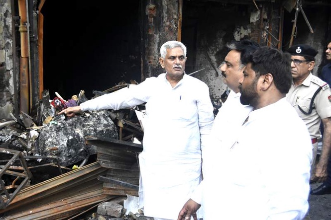 Image from: Rohtak fire tragedy: Bhupinder Hooda meets affected traders, demands enhanced relief