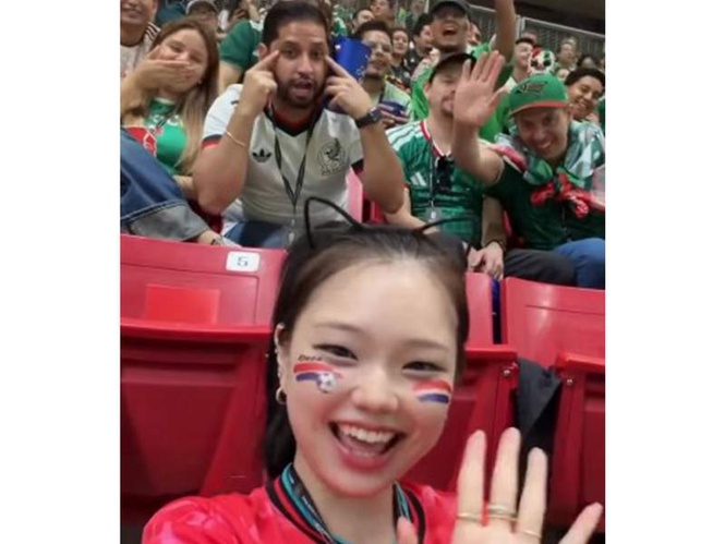 Image from: Mexican trade group chief removed after racist gesture toward South Korean influencer at FIFA World Cup match
