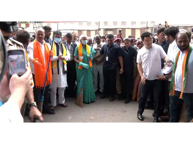 Image from: Bengaluru: Finance Minister Nirmala Sitharaman participates in Swachh Bharat drive near Anjaneya Swamy Temple