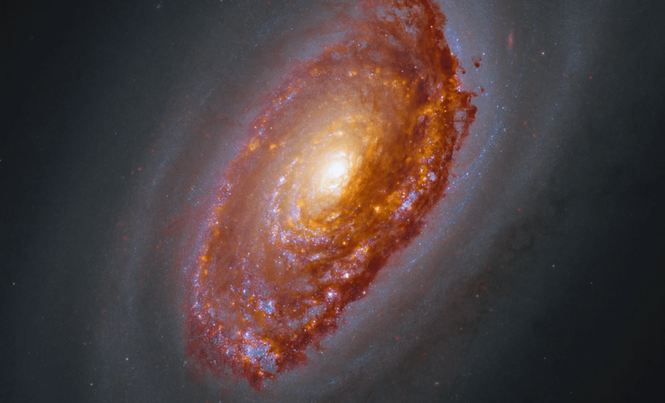 Image from: NASA Captures Stunning View Of A Galaxy With A Billion-Year-Old Scar