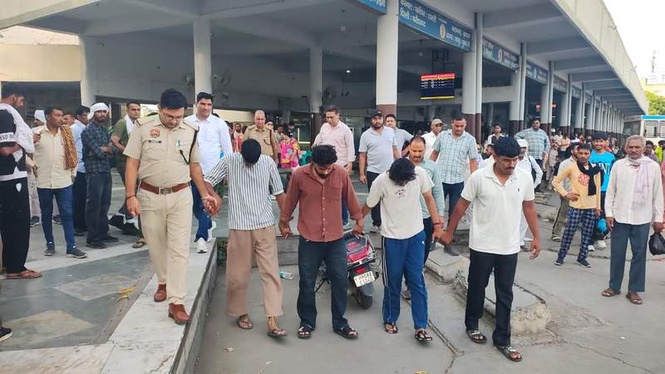 Image from: Kaithal police parade assault accused at crime scene