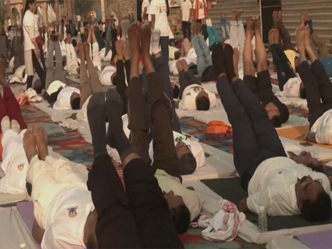 Image from: Uttar Pradesh: Yoga Week begins at Namo Ghat in Varanasi ahead of International Yoga Day