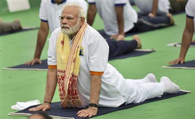 Image from: PM Modi to lead International Yoga Day event in Kolkata; Centre plans global push through 2,500 programmes