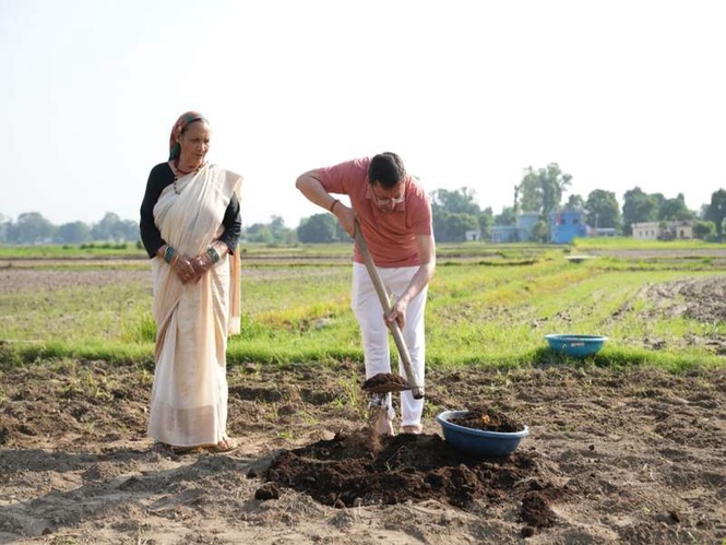 Image from: Uttarakhand CM Dhami promotes organic farming, ploughs field at private residence in Khatima